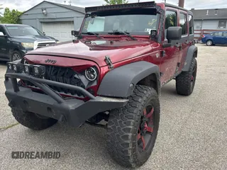 2012 Jeep Wrangler Unlimited Sport with VIN 1C4BJWDG5CL289329, listed as a Copart auction lot 65816775 with 152,632 mi miles and Clean title. Bid and sale history available at DreamBid. Image 2.