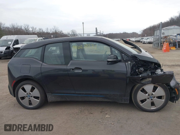 2015 BMW i3 z VIN WBY1Z4C5XFV501268, wystawiony jako IAAI lot #41028732 z przebiegiem 75 283 mil mil oraz . Historia ofert i sprzedaży dostępna na DreamBid. Obrazek 13.