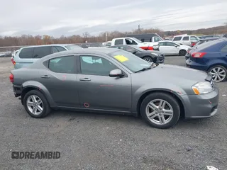 2013 Dodge Avenger SXT with VIN 1C3CDZCB6DN568480, listed as a IAAI auction lot 38104186 with 129,203 mi miles and . Bid and sale history available at DreamBid. Image 13.
