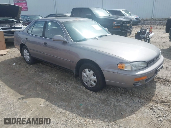 1996 Toyota Camry DX with VIN 4T1BG12K8TU762073, listed as a IAAI auction lot 41606136 with 254,939 mi miles. Bid and sale history available at carsss.com. Image 1.