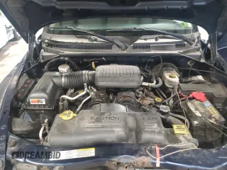 2004 Dodge Dakota z VIN 1D7GG16KX4S586053, wystawiony jako Copart lot #60221585 z przebiegiem 150 150 mil mil oraz Szkoda całkowita • Salvage title. Historia ofert i sprzedaży dostępna na DreamBid. Obrazek 11.