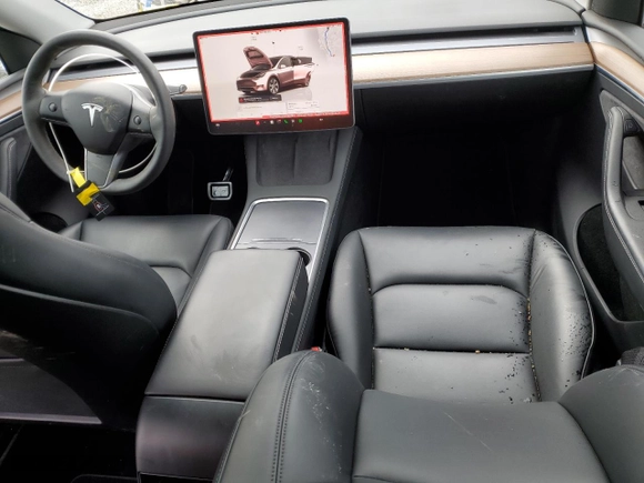 2023 Tesla Model Y Long Range with VIN 7SAYGDEE8PA069783, listed as a Copart auction lot 44635395 with 34,823 mi miles and Salvage Title. Bid and sale history available at carsss.com. Image 8.