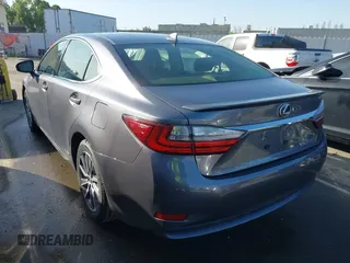 2016 Lexus ES 300h z VIN JTHBW1GG6G2108510, wystawiony jako IAAI lot #41959175 z przebiegiem 142 882 mil mil oraz . Historia ofert i sprzedaży dostępna na DreamBid. Obrazek 3.