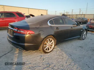 2015 Jaguar XF V6 Portfolio with VIN SAJWA0F76F8U59802, listed as a Copart auction lot 77198104 with 98,859 mi miles and Clean Title. Bid and sale history available at carsss.com. Image 3.