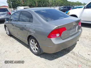 2006 Honda Civic LX with VIN 1HGFA16586L104230, listed as a IAAI auction lot 42215822 with 128,704 mi miles and . Bid and sale history available at DreamBid. Image 3.
