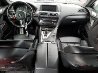 2015 BMW M6 z VIN WBS6C9C59FD467943, wystawiony jako Copart lot #63477904 z przebiegiem 80 186 mil mil oraz Szkody całkowita. Historia ofert i sprzedaży dostępna na DreamBid. Obrazek 8.