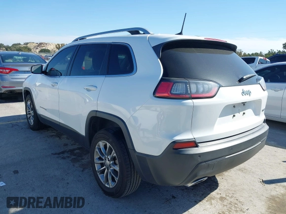 2019 Jeep Cherokee Latitude Plus with VIN 1C4PJLLNXKD290098, listed as a IAAI auction lot 40840063 with 202,244 mi miles and . Bid and sale history available at DreamBid. Image 3.