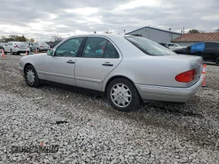 1997 Mercedes-Benz E-Class with VIN WDBJF55F1VA309179, listed as a Copart auction lot 79222994 with 122,100 mi miles and Salvage Title. Bid and sale history available at carsss.com. Image 2.
