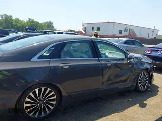 2017 Lincoln MKZ Hybrid Black Label with VIN 3LN6L5NU8HR639681, listed as a IAAI auction lot 42571227 with 123,522 mi miles and . Bid and sale history available at DreamBid. Image 13.