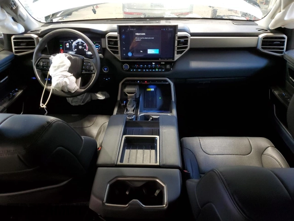 2023 Toyota Tundra Limited Hybrid with VIN 5TFJC5DB5PX015177, listed as a Copart auction lot 87896795 with 77,113 mi miles and Salvage title. Bid and sale history available at DreamBid. Image 8.