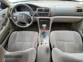 2000 Mazda 626 LX with VIN 1YVGF22D8Y5126950, listed as a Copart auction lot 69440124 with 208,584 mi miles and Salvage Title. Bid and sale history available at carsss.com. Image 8.