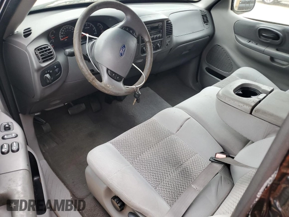2003 Ford F-150 XL z VIN 1FTRX17W53NB84703, wystawiony jako Copart lot #51608895 z przebiegiem 291 806 mil mil oraz Szkoda całkowita • Salvage title. Historia ofert i sprzedaży dostępna na DreamBid. Obrazek 8.
