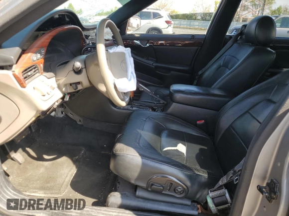 2001 Cadillac DeVille z VIN 1G6KD54Y41U273417, wystawiony jako Copart lot #55604295 z przebiegiem Nie podano mil oraz Szkoda całkowita • Salvage title. Historia ofert i sprzedaży dostępna na DreamBid. Obrazek 7.