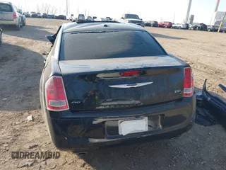 2014 Chrysler 300 with VIN 2C3CCAGT6EH209437, listed as a IAAI auction lot 41780106 with 153,414 mi miles. Bid and sale history available at carsss.com. Image 16.