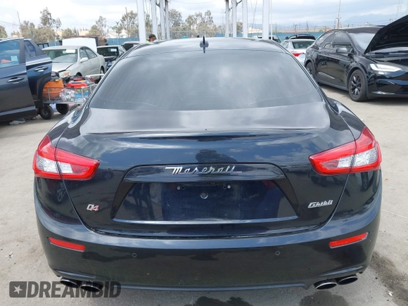 2014 Maserati Ghibli S Q4 with VIN ZAM57RTA0E1101059, listed as a IAAI auction lot 42121292 with 107,901 mi miles and . Bid and sale history available at DreamBid. Image 17.