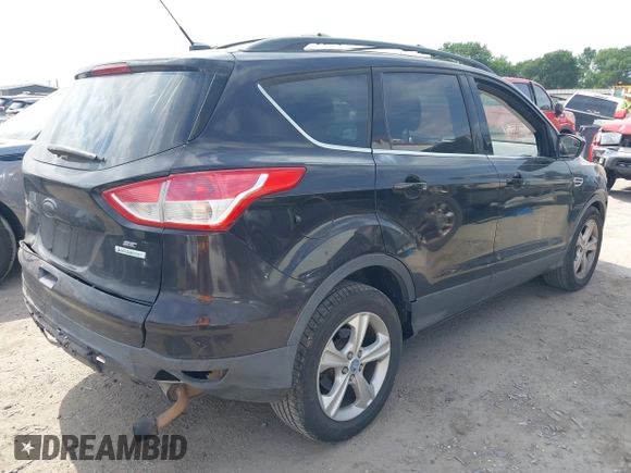 2013 Ford Escape SE with VIN 1FMCU0G96DUC34594, listed as a IAAI auction lot 42040437 with 161,847 mi miles and . Bid and sale history available at DreamBid. Image 4.