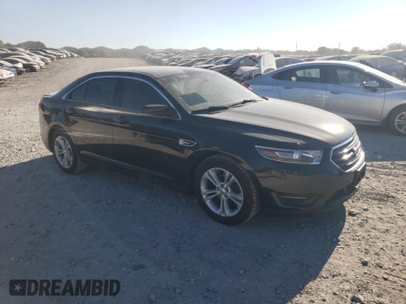 2015 Ford Taurus SEL with VIN 1FAHP2E90FG148821, listed as a Copart auction lot 77557384 with 141,514 mi miles and Salvage Title. Bid and sale history available at DreamBid. Image 4.