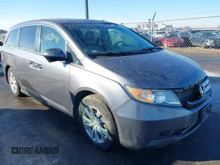 2014 Honda Odyssey EX-L with VIN 5FNRL5H61EB079739, listed as a IAAI auction lot 41659048 with 137,012 mi miles and . Bid and sale history available at carsss.com. Image 1.