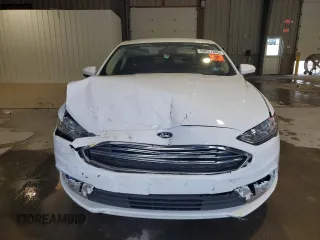 2018 Ford Fusion SE с VIN 3FA6P0LU7JR177723, выставлен на аукционе Copart как лот 60821345 с пробегом 89 841 миль миль и Списание • Salvage title. История ставок и продаж доступна на DreamBid. Изображение 5.