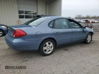 2000 Ford Taurus SEL with VIN 1FAFP56S2YG160062, listed as a Copart auction lot 82297744 with 97,218 mi miles and Salvage title. Bid and sale history available at DreamBid. Image 3.