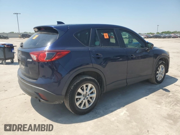 2014 Mazda CX-5 Touring z VIN JM3KE2CYXE0327950, wystawiony jako Copart lot #51390585 z przebiegiem 129 523 mil mil oraz Czysty tytuł • Clean title. Historia ofert i sprzedaży dostępna na DreamBid. Obrazek 3.