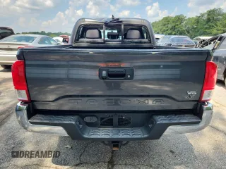 2017 Toyota Tacoma SR5 with VIN 3TMAZ5CNXHM044286, listed as a Copart auction lot 61455145 with 112,079 mi miles and Salvage title. Bid and sale history available at DreamBid. Image 6.