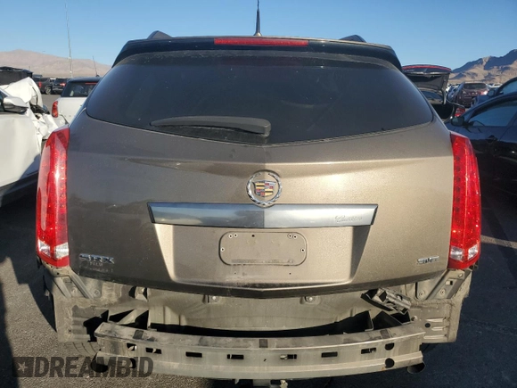 2014 Cadillac SRX z VIN 3GYFNAE34ES561414, wystawiony jako Copart lot #44760395 z przebiegiem 131 723 mil mil oraz Szkoda całkowita • Salvage title. Historia ofert i sprzedaży dostępna na DreamBid. Obrazek 6.
