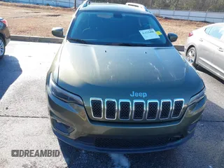 2019 Jeep Cherokee Latitude with VIN 1C4PJLCB3KD416517, listed as a IAAI auction lot 41275406 with 83,321 mi miles. Bid and sale history available at carsss.com. Image 6.