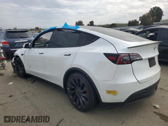 2022 Tesla Model Y Performance with VIN 7SAYGDEF1NF410241, listed as a Copart auction lot 45017155 with 42,652 mi miles and Salvage Title. Bid and sale history available at DreamBid. Image 2.