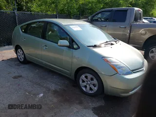 2007 Toyota Prius z VIN JTDKB20U877626737, wystawiony jako IAAI lot #42384250 z przebiegiem 128 560 mil mil oraz . Historia ofert i sprzedaży dostępna na DreamBid. Obrazek 1.
