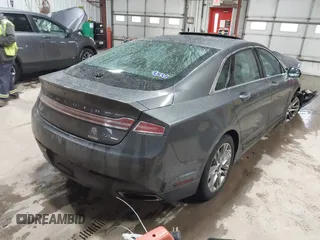 2015 Lincoln MKZ with VIN 3LN6L2G94FR607573, listed as a IAAI auction lot 41947202 with Not Provided miles and . Bid and sale history available at DreamBid. Image 4.