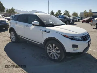 2015 Land Rover Range Rover Evoque Prestige with VIN SALVV2BGXFH958725, listed as a Copart auction lot 74386694 with 121,555 mi miles and Salvage title. Bid and sale history available at DreamBid. Image 4.
