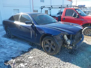 2014 Dodge Charger SE with VIN 2C3CDXBG4EH295650, listed as a IAAI auction lot 41274248 with 259,390 mi miles and . Bid and sale history available at carsss.com. Image 1.