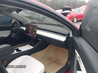 2018 Tesla Model 3 Long Range Battery z VIN 5YJ3E1EB7JF135199, wystawiony jako IAAI lot #41580853 z przebiegiem 131 774 mil mil oraz . Historia ofert i sprzedaży dostępna na DreamBid. Obrazek 5.