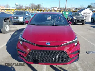 2023 Toyota Corolla Hybrid LE with VIN JTDBCMFE2PJ008826, listed as a IAAI auction lot 41428742 with 21,256 mi miles. Bid and sale history available at carsss.com. Image 12.
