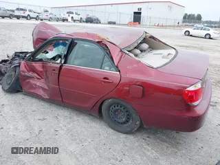 2006 Toyota Camry STD z VIN 4T1BE32K76U148573, wystawiony jako IAAI lot #38901398 z przebiegiem Nie podano mil oraz . Historia ofert i sprzedaży dostępna na DreamBid. Obrazek 3.