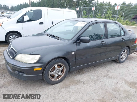 2002 Mitsubishi Lancer OZ-Rally z VIN JA3AJ86EX2U059845, wystawiony jako IAAI lot #42371709 z przebiegiem 207 665 mil mil oraz . Historia ofert i sprzedaży dostępna na DreamBid. Obrazek 2.
