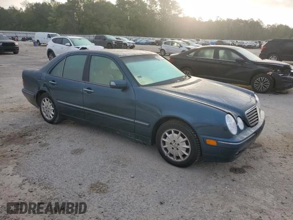 2000 Mercedes-Benz E-Class with VIN WDBJF65J1YB103093, listed as a Copart auction lot 51587325 with 208,350 mi miles and Salvage Title. Bid and sale history available at carsss.com. Image 4.