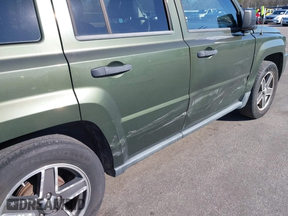 2009 Jeep Patriot Sport with VIN 1J4FT28B99D139661, listed as a IAAI auction lot 41644514 with 155,117 mi miles and . Bid and sale history available at DreamBid. Image 12.