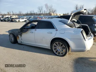 2012 Chrysler 300 C with VIN 2C3CCAKT6CH143430, listed as a Copart auction lot 82998034 with Not Provided miles and Salvage Title. Bid and sale history available at DreamBid. Image 2.
