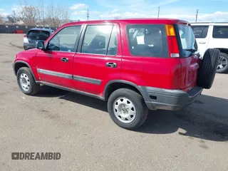 1999 Honda CR-V LX with VIN JHLRD1841XC071583, listed as a IAAI auction lot 41657213 with 208,874 mi miles. Bid and sale history available at carsss.com. Image 3.