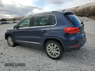 2016 Volkswagen Tiguan SE with VIN WVGBV7AX3GW532425, listed as a Copart auction lot 48720835 with 88,312 mi miles and Salvage Title. Bid and sale history available at DreamBid. Image 2.