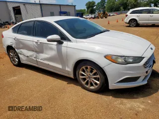 2017 Ford Fusion SE z VIN 3FA6P0H77HR235214, wystawiony jako Copart lot #63560815 z przebiegiem 273 965 mil mil oraz Szkoda całkowita • Salvage title. Historia ofert i sprzedaży dostępna na DreamBid. Obrazek 4.