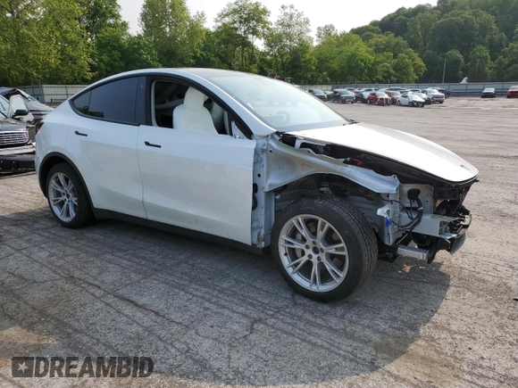 2022 Tesla Model Y Long Range z VIN 7SAYGDEE5NF355624, wystawiony jako Copart lot #58058465 z przebiegiem 33 784 mil mil oraz Szkoda całkowita • Salvage title. Historia ofert i sprzedaży dostępna na DreamBid. Obrazek 4.