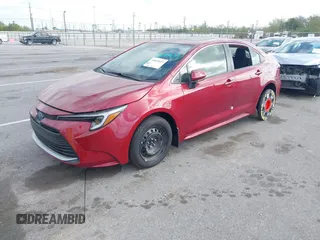 2024 Toyota Corolla Hybrid LE with VIN JTDBCMFE7RJ036303, listed as a IAAI auction lot 41835433 with 5 mi miles. Bid and sale history available at carsss.com. Image 2.