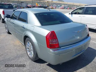 2006 Chrysler 300 C with VIN 2C3LA63H26H130160, listed as a IAAI auction lot 42170192 with 124,206 mi miles. Bid and sale history available at carsss.com. Image 3.