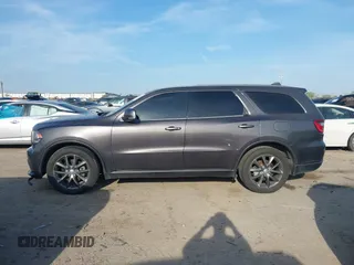 2015 Dodge Durango R/T with VIN 1C4SDHCT8FC833943, listed as a IAAI auction lot 41898447 with 209,999 mi miles and . Bid and sale history available at DreamBid. Image 14.