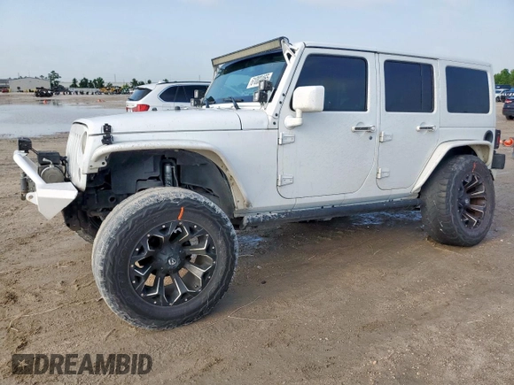 2015 Jeep Wrangler Unlimited Sport with VIN 1C4BJWDG9FL759012, listed as a Copart auction lot 61002465 with 101,395 mi miles and Salvage title. Bid and sale history available at DreamBid. Image 1.
