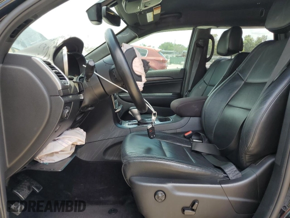 2018 Jeep Grand Cherokee Laredo E with VIN 1C4RJEAG1JC354221, listed as a Copart auction lot 58002715 with 108,223 mi miles and Salvage title. Bid and sale history available at DreamBid. Image 7.