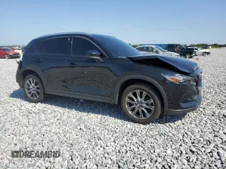2021 Mazda CX-5 Signature with VIN JM3KFBEY5M0439676, listed as a Copart auction lot 52823285 with 41,811 mi miles and Non Repairable. Bid and sale history available at carsss.com. Image 4.
